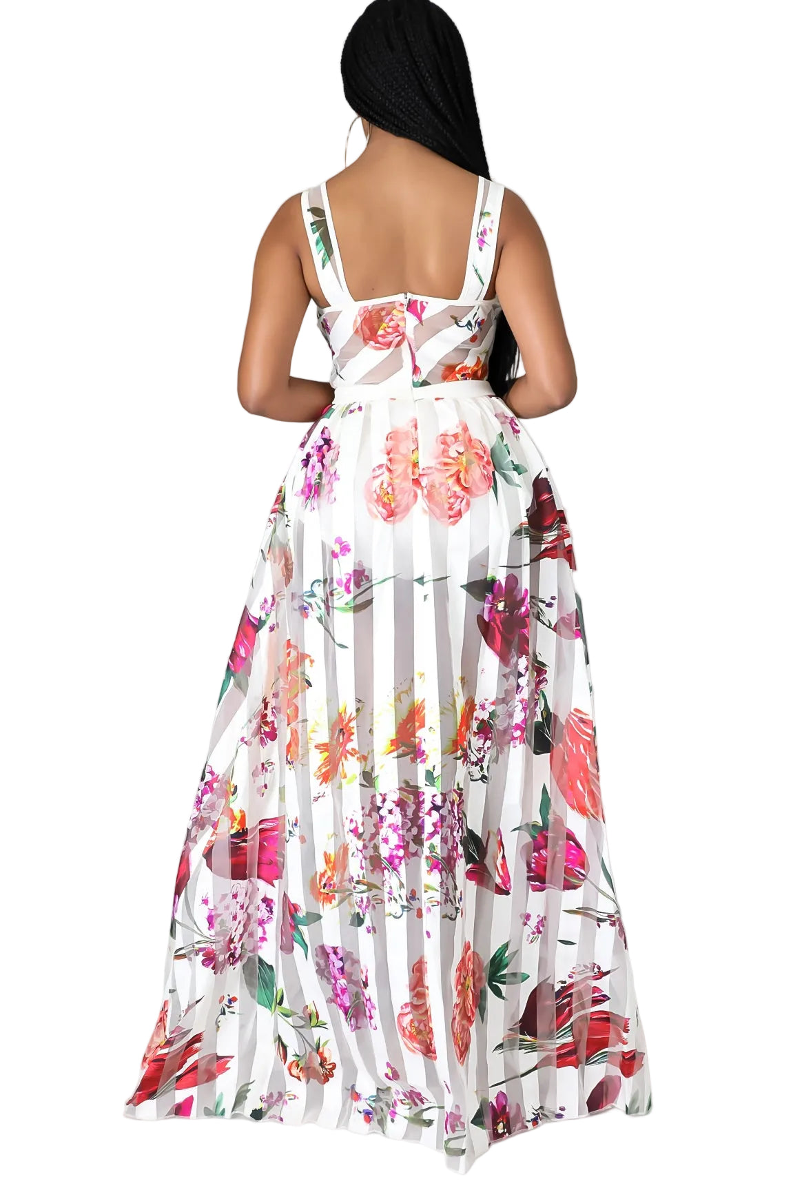 Woman wearing a floral dress with a gray background