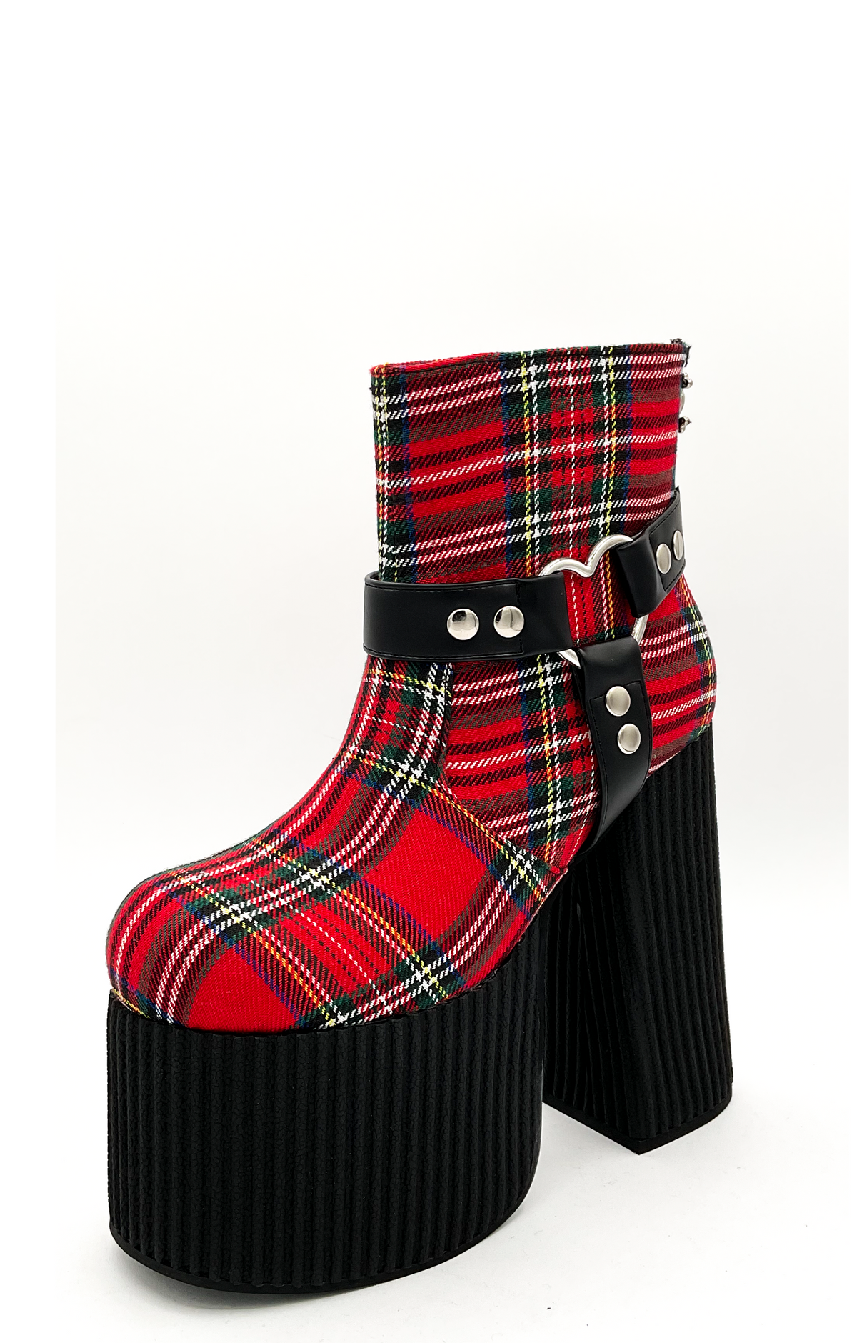 Red plaid platform boot with black sole on a white background