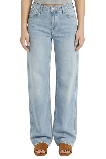 Light blue jeans worn by a person on a white background