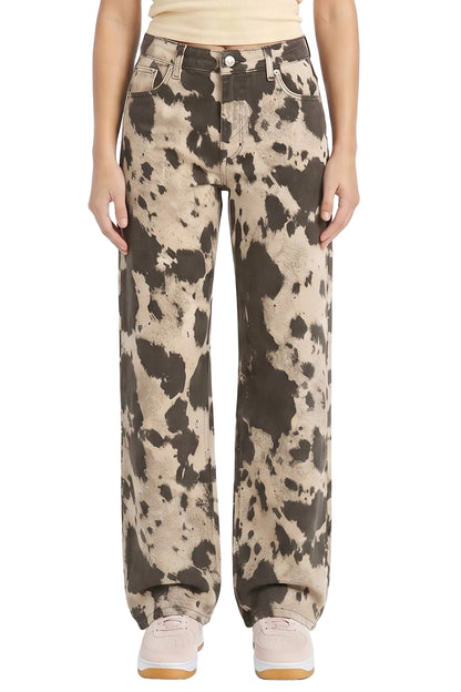 Person wearing camouflage pants on a white background