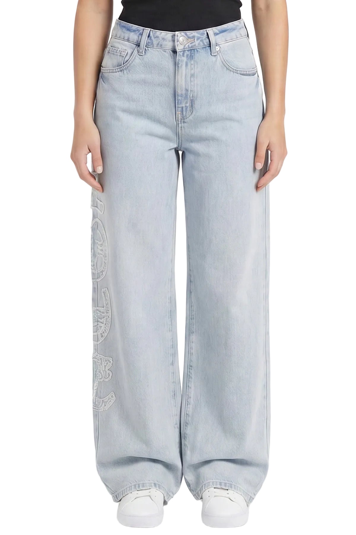 Light blue jeans worn by a person on a white background