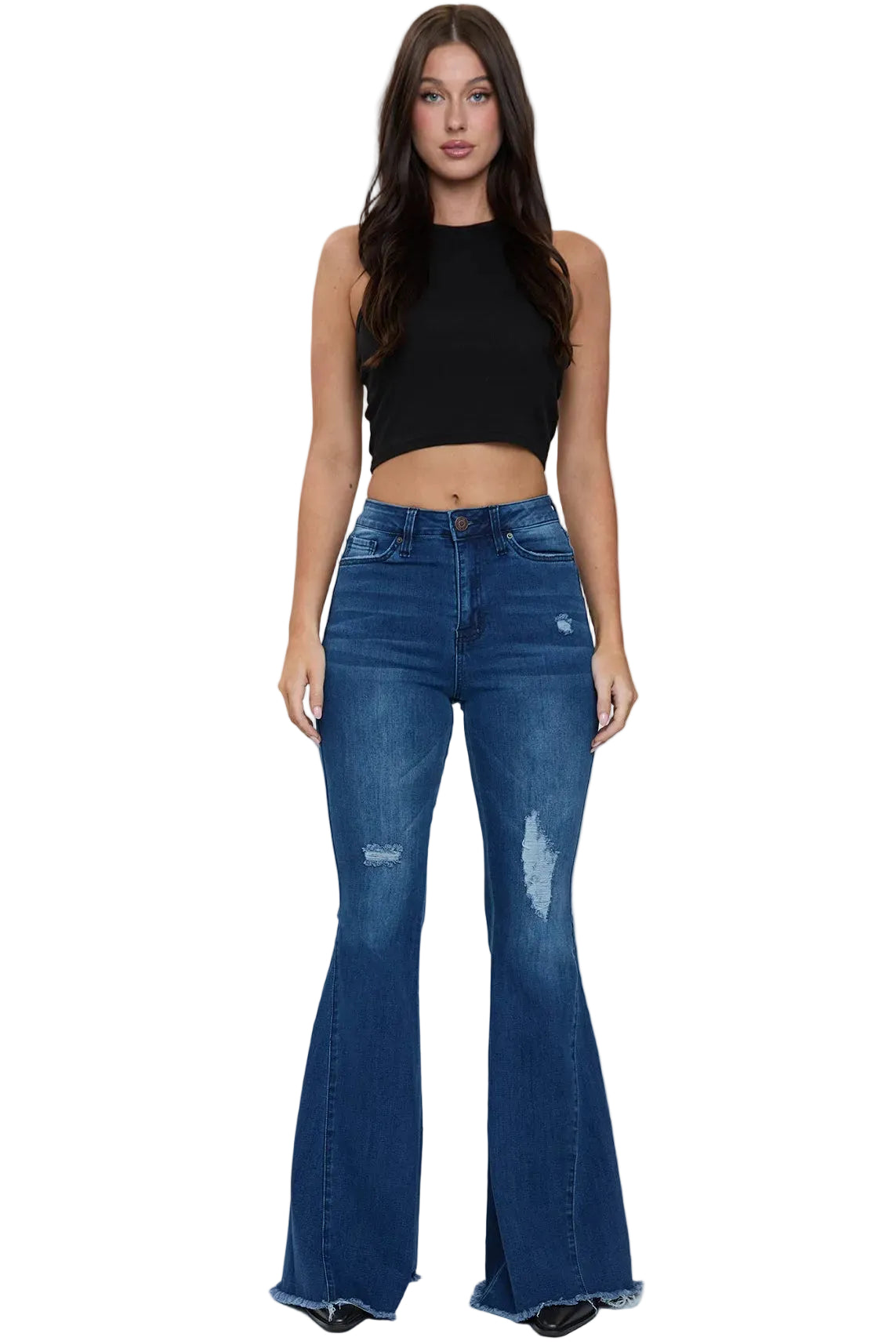 Woman wearing blue flared jeans and a black top on a white background