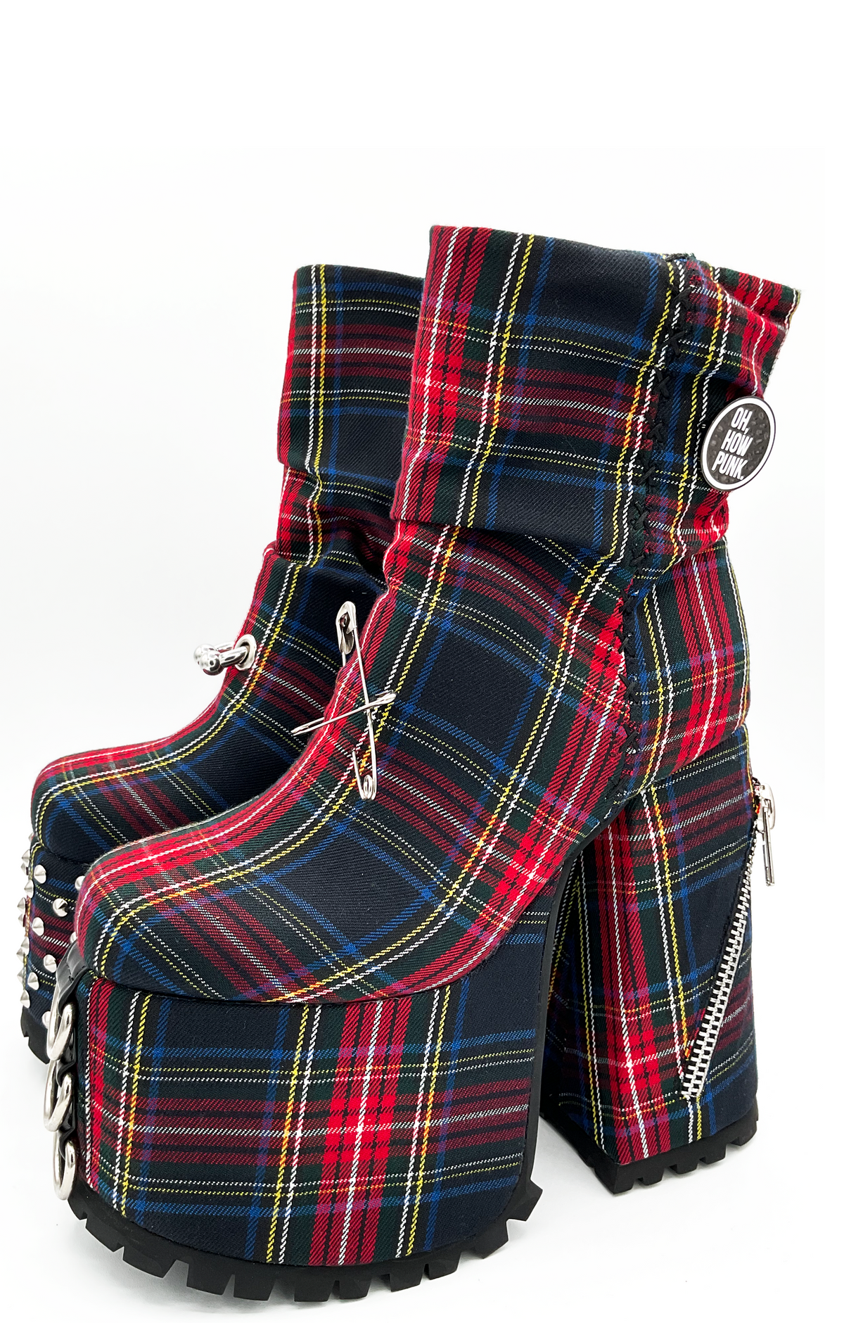 Plaid platform boots with zippers on a white background