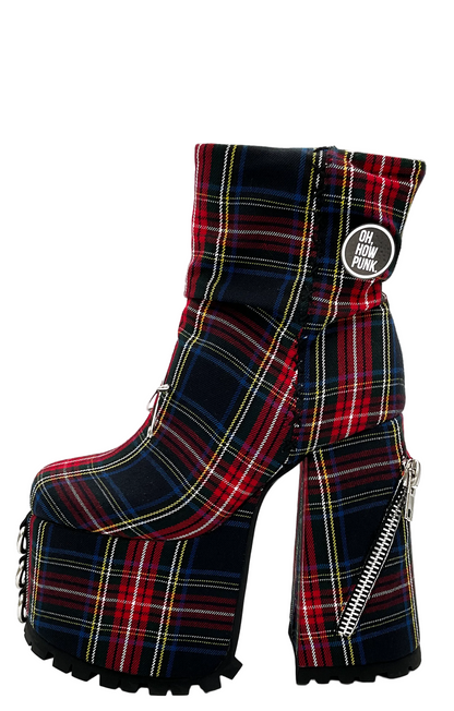 Plaid platform boots with a visible brand label on a white background