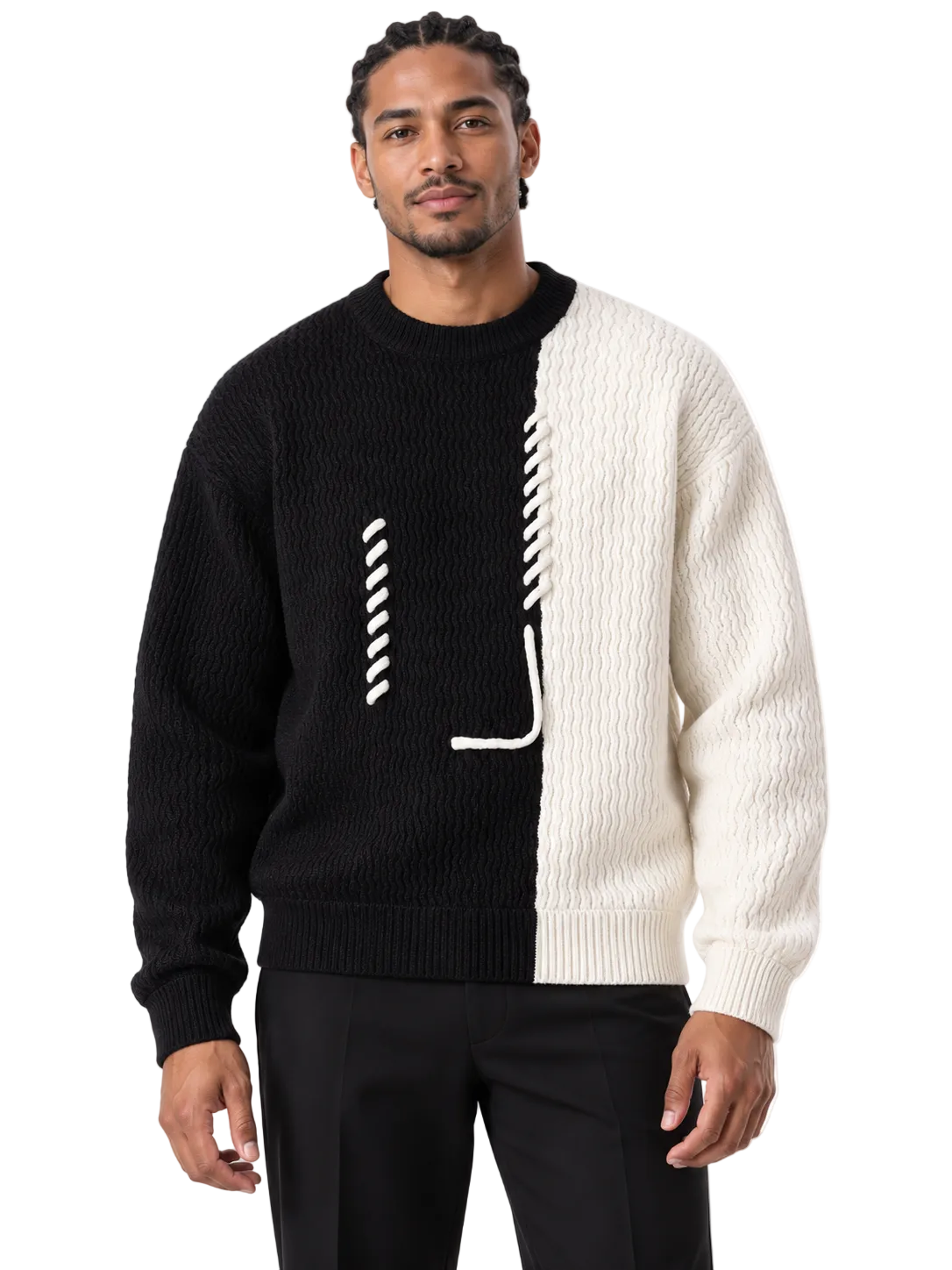 A man wearing a black and off-white split-knit sweater with white graphic details, paired with black pants, against a plain white background.