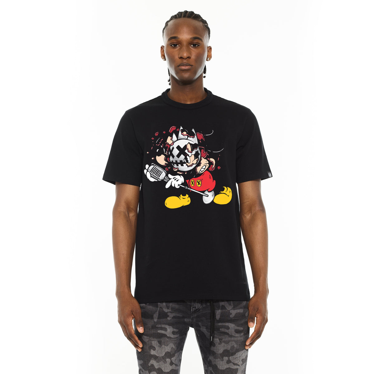Person wearing a black t-shirt with a colorful graphic design on a white background