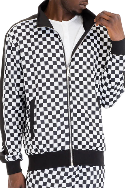 Person wearing a black and white checkered jacket and pants.