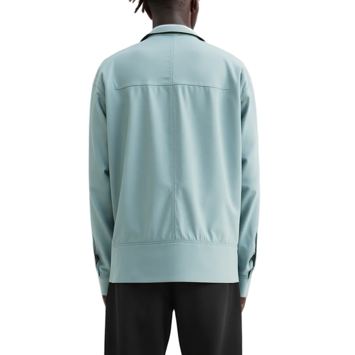 Light blue jacket worn by a person on a white background