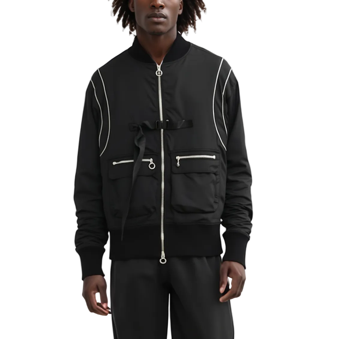 Person wearing a black jacket with white accents on a white background