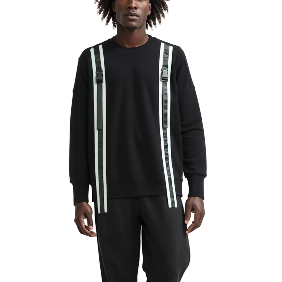 Person wearing a black outfit with suspenders on a white background
