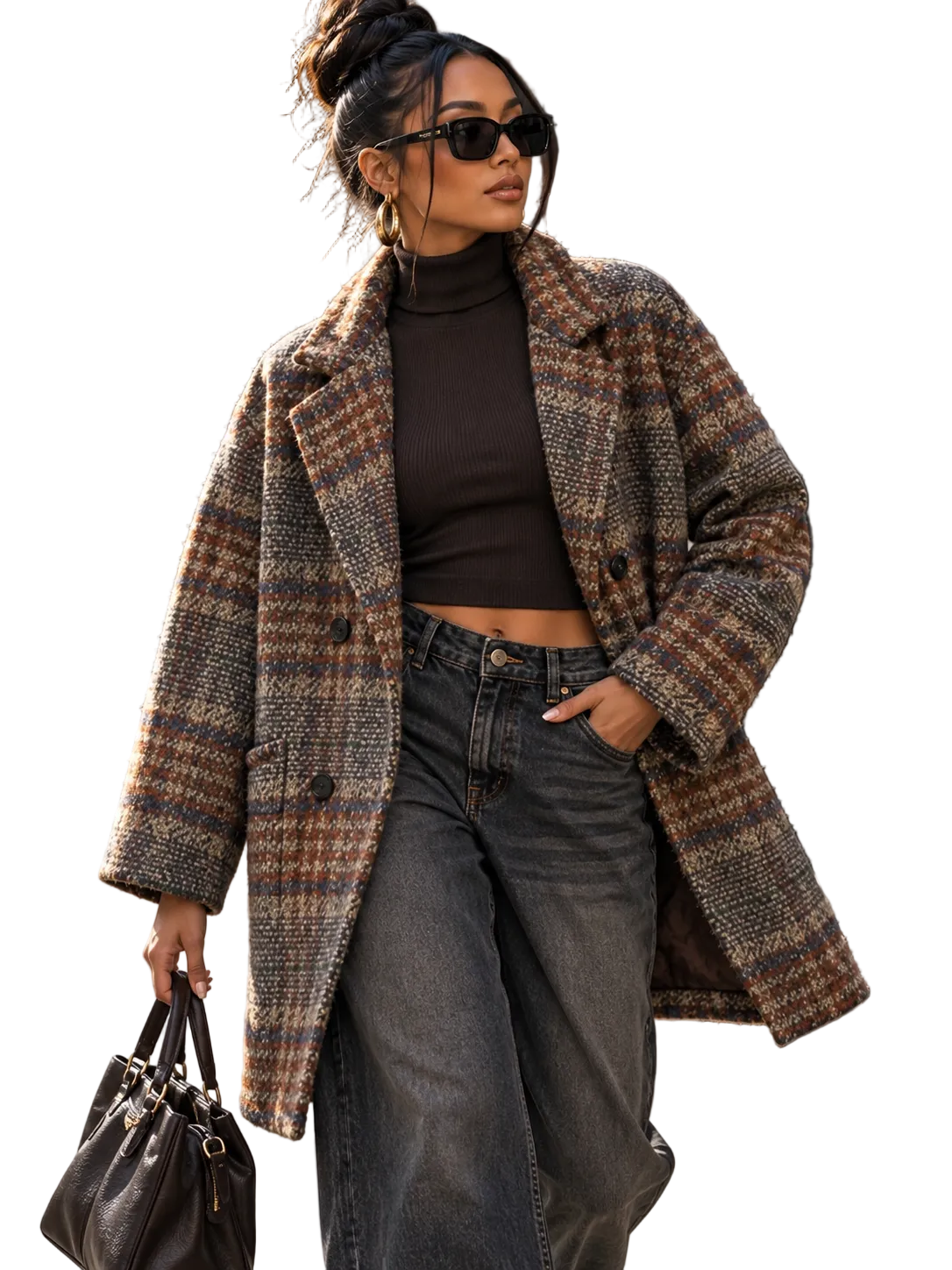 A woman wearing a brown and beige plaid wool-blend coat over a dark brown turtleneck, wide-leg gray jeans, and black sunglasses, carrying a dark brown handbag on a city street.