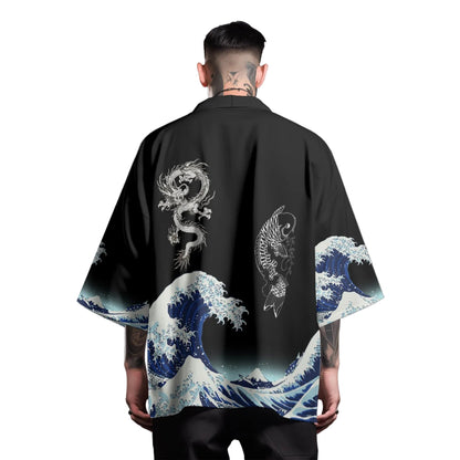Person wearing a black kimono with wave and dragon design on a gray background