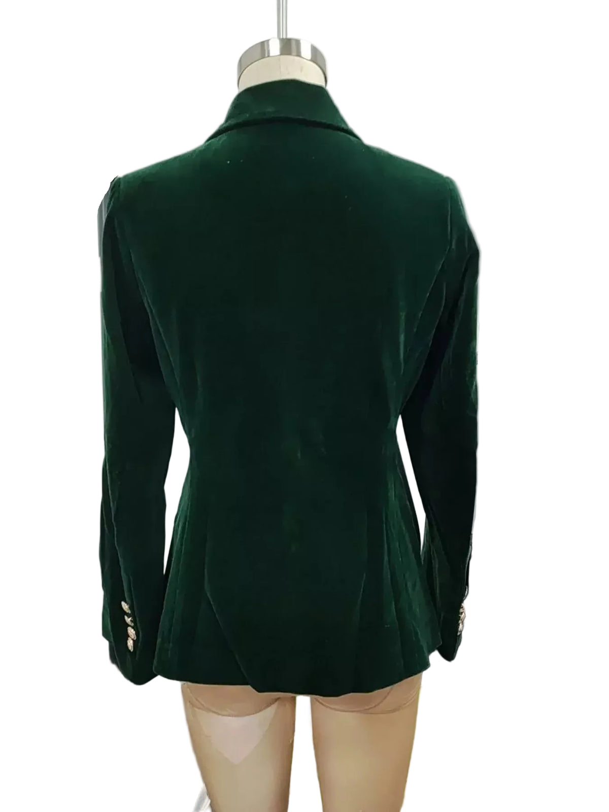 Green blazer on a mannequin against a plain background