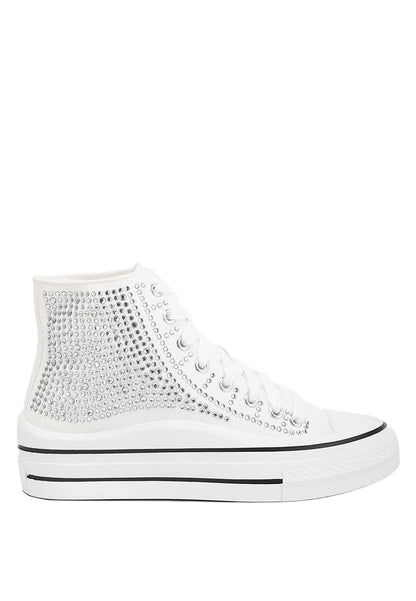 White high-top sneaker with textured top on a light gray background