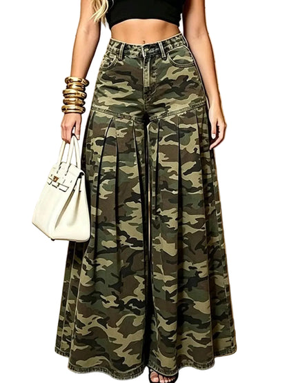 A model wearing high-waisted, wide-leg camouflage pants, styled with a black crop top, gold bracelets, and a white handbag while standing on stone stairs.