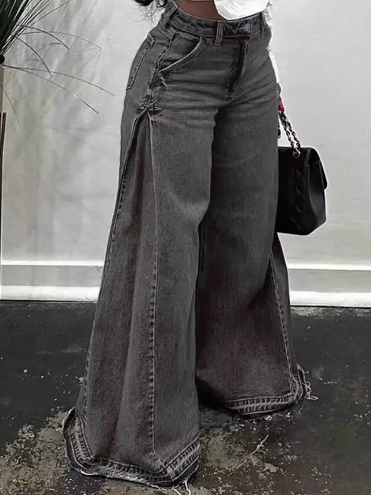 High-waisted wide-leg statement jeans with side panel detailing