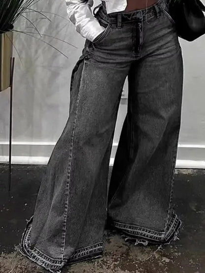High-waisted wide-leg statement jeans with side panel detailing