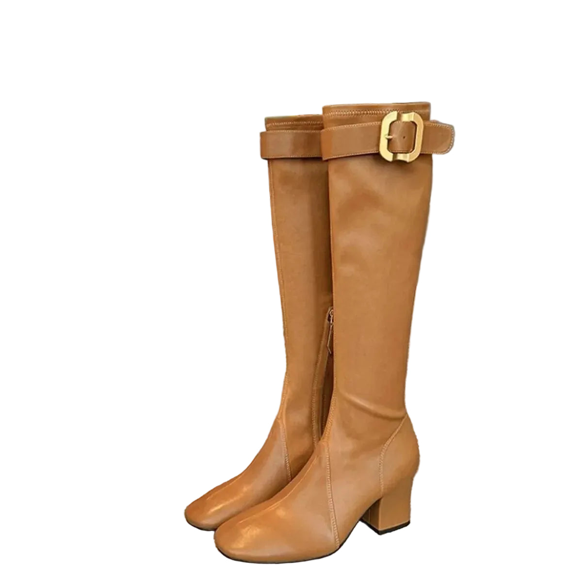 A pair of knee-high tan leather boots with a side zipper and a gold buckle detail on the upper strap, displayed on a gray upholstered chair in an indoor setting.