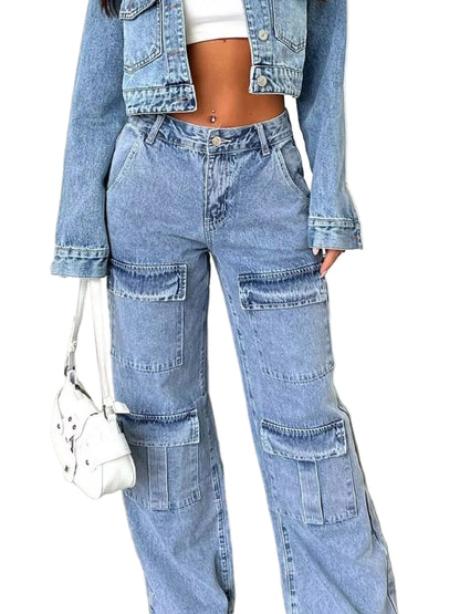 A person wearing light-wash blue denim cargo pants with a matching cropped denim jacket, a white crop top, and carrying a small white handbag in an indoor setting.