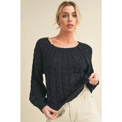 Cable-Knit Openwork Round Neck Sweater.