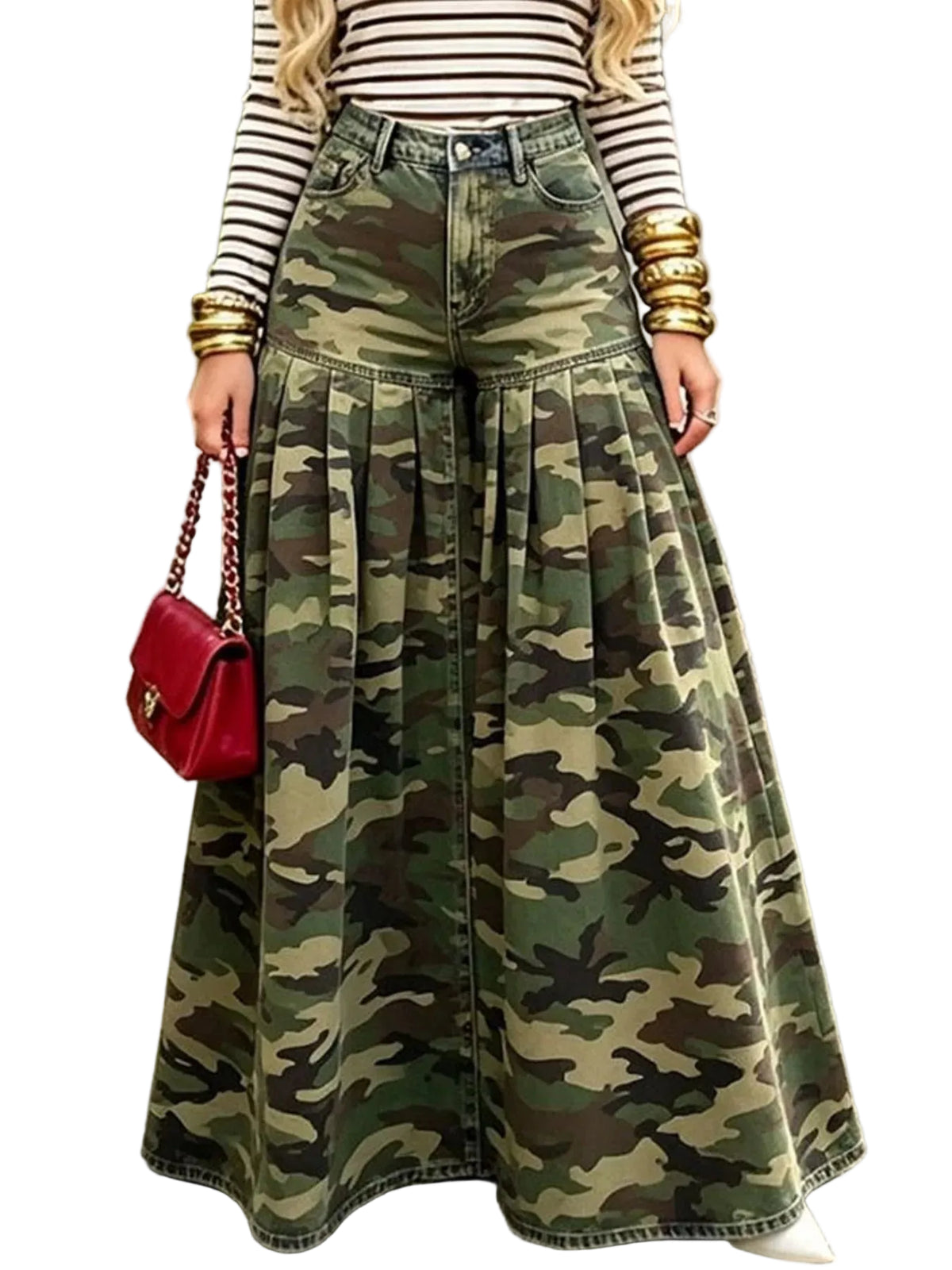 A person standing on a garden path wearing a high-waisted, wide-leg camouflage denim skirt paired with a black and white striped long-sleeve top and gold bracelets, holding a red handbag.