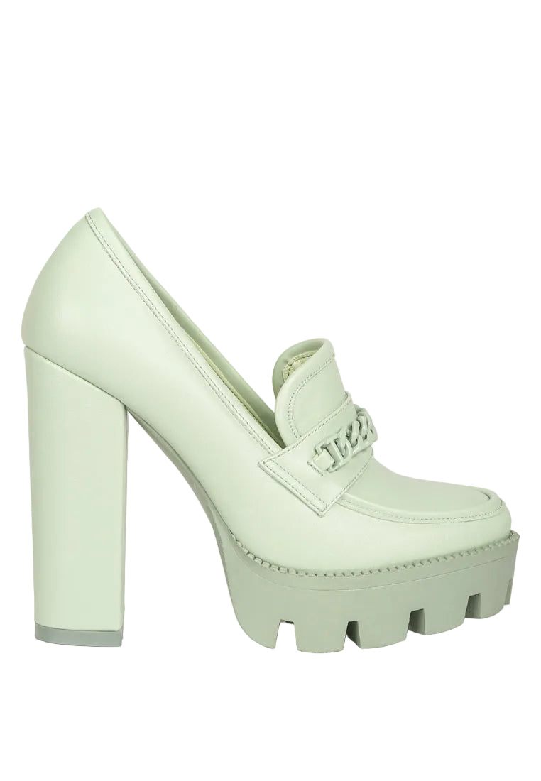 Mint green platform shoe on a white background