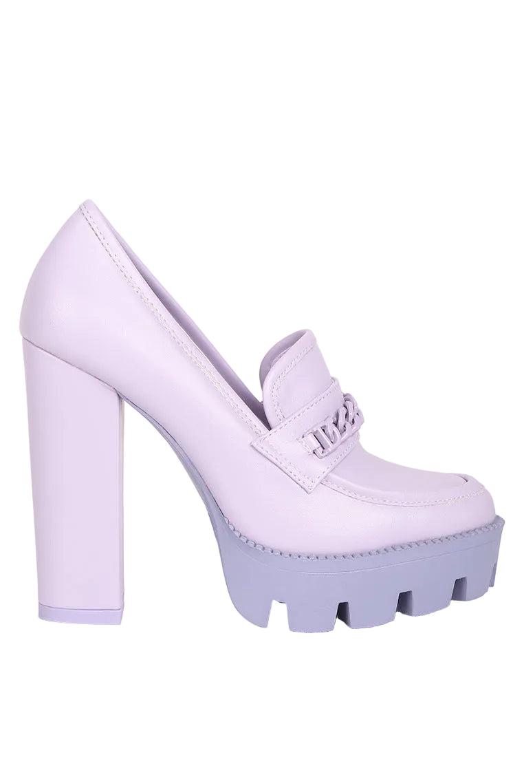 A single light purple platform high heel shoe with a chunky block heel, lug sole, and a decorative chain detail on the strap, shown against a light gray background.