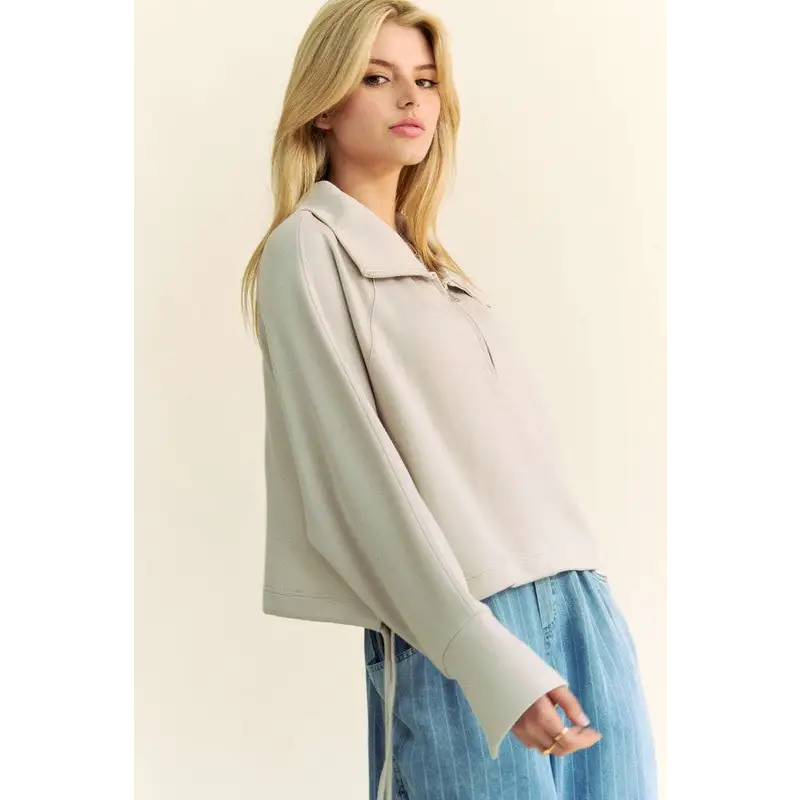 Davi & Dani Drawstring Hem Half Zip Raglan Sleeve Sweatshirt.