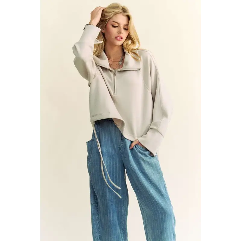 Davi & Dani Drawstring Hem Half Zip Raglan Sleeve Sweatshirt.