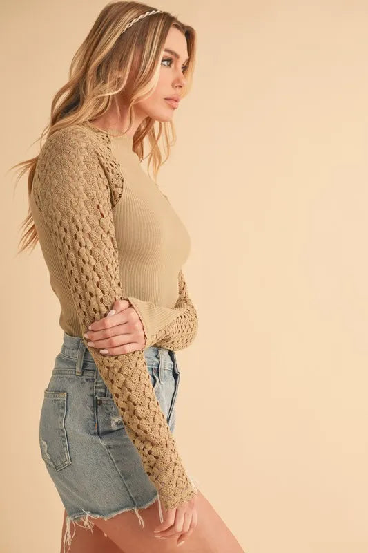 Mock Neck Ribbed Knit Top with Crochet Sleeve.