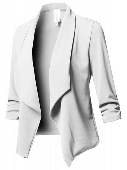 A light gray open-front draped jacket with three-quarter sleeves, styled over a matching gray top on a plain white background.