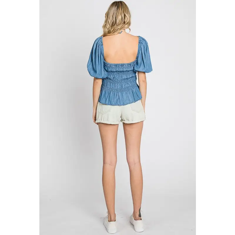 Denim Smocked Peplum Top.