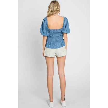 Denim Smocked Peplum Top.