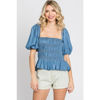 Denim Smocked Peplum Top.