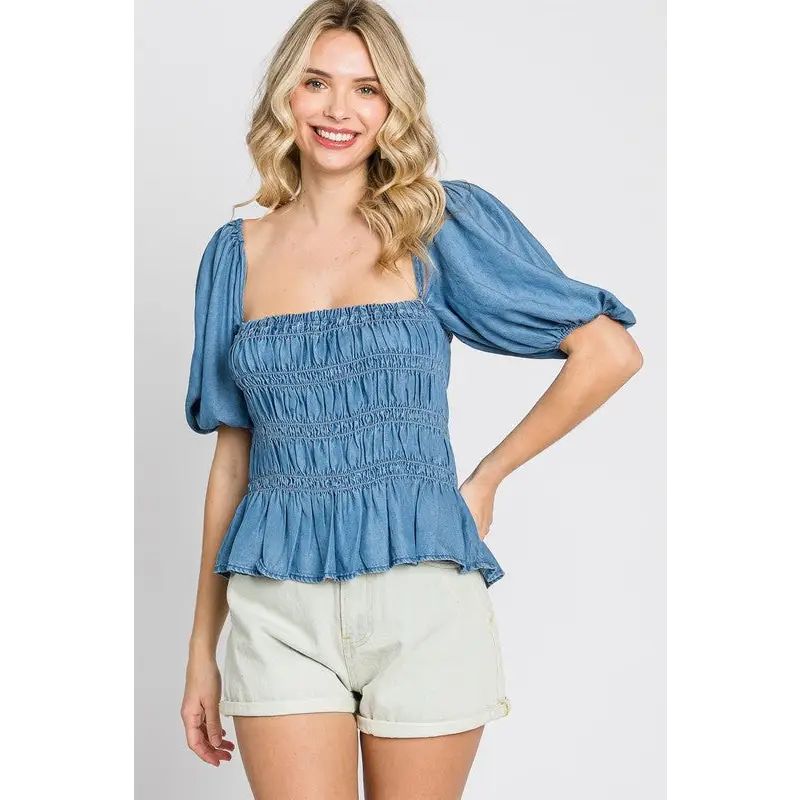 Denim Smocked Peplum Top.