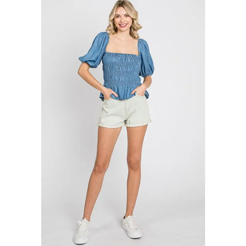 Denim Smocked Peplum Top.