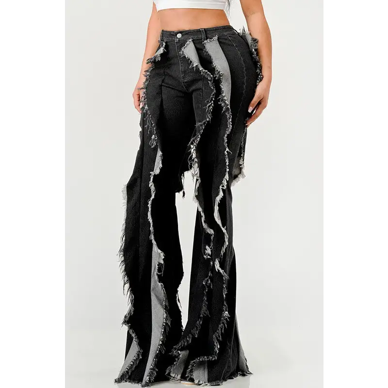 Distressed Denim Frill Jeans.