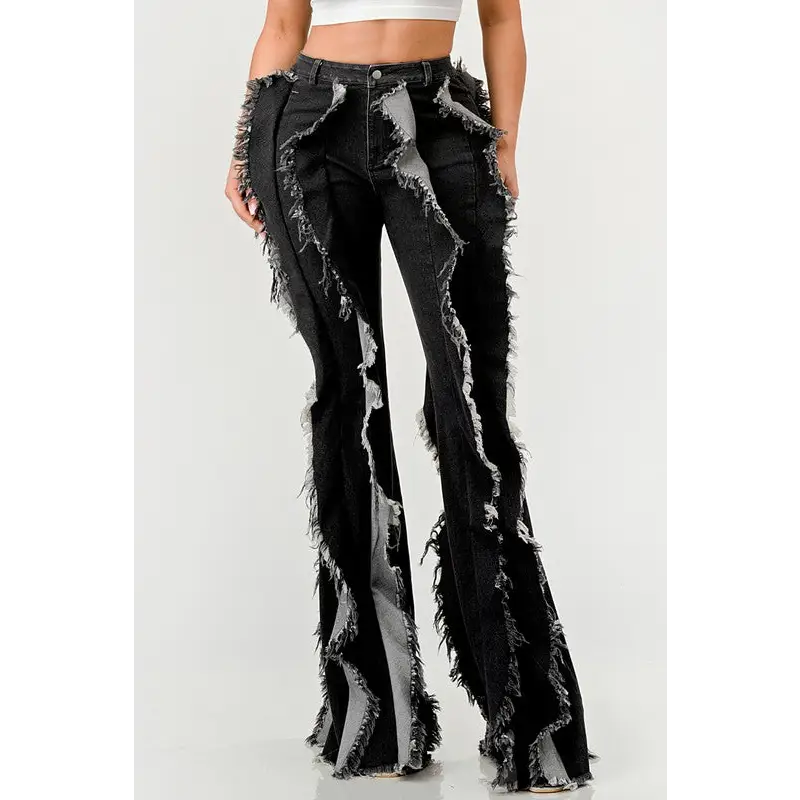Distressed Denim Frill Jeans.