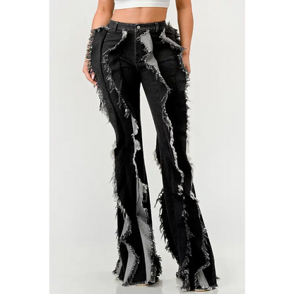 Distressed Denim Frill Jeans.