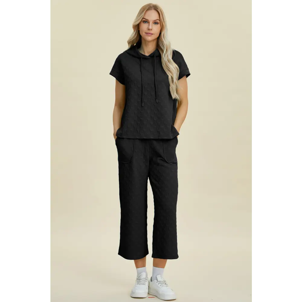 Double Take Full Size Texture Drawstring Short Sleeve Hoodie and Pocketed Pants Set.