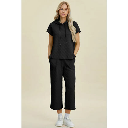 Double Take Full Size Texture Drawstring Short Sleeve Hoodie and Pocketed Pants Set.