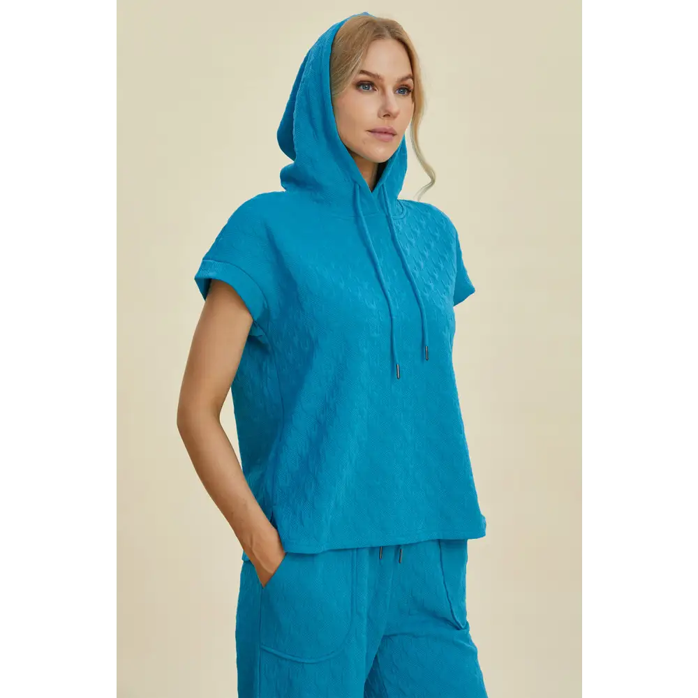 Double Take Full Size Texture Drawstring Short Sleeve Hoodie and Pocketed Pants Set.