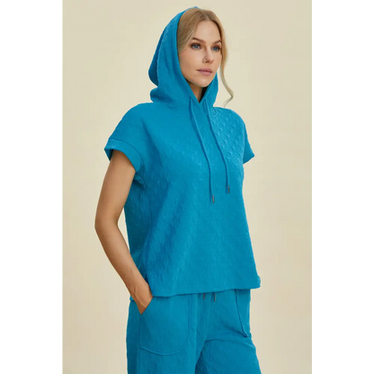 Double Take Full Size Texture Drawstring Short Sleeve Hoodie and Pocketed Pants Set.