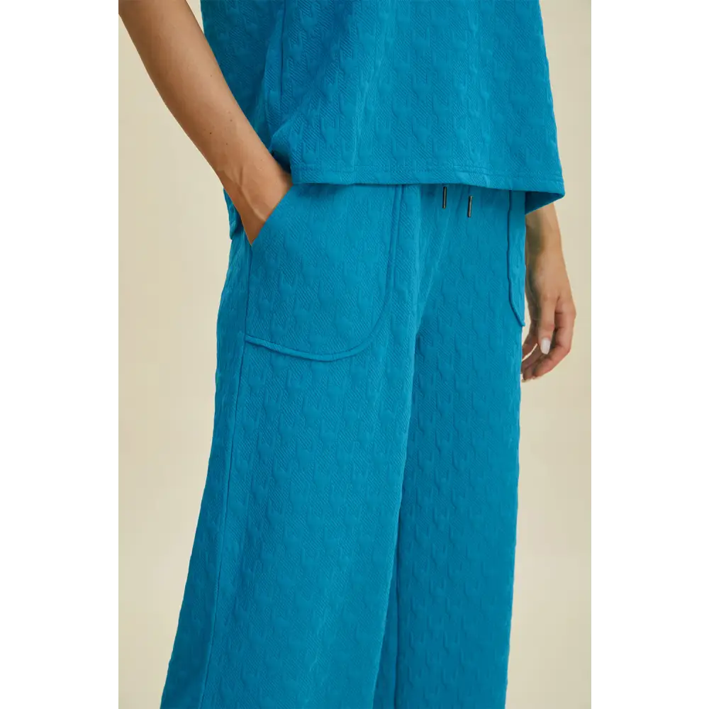 Double Take Full Size Texture Drawstring Short Sleeve Hoodie and Pocketed Pants Set.