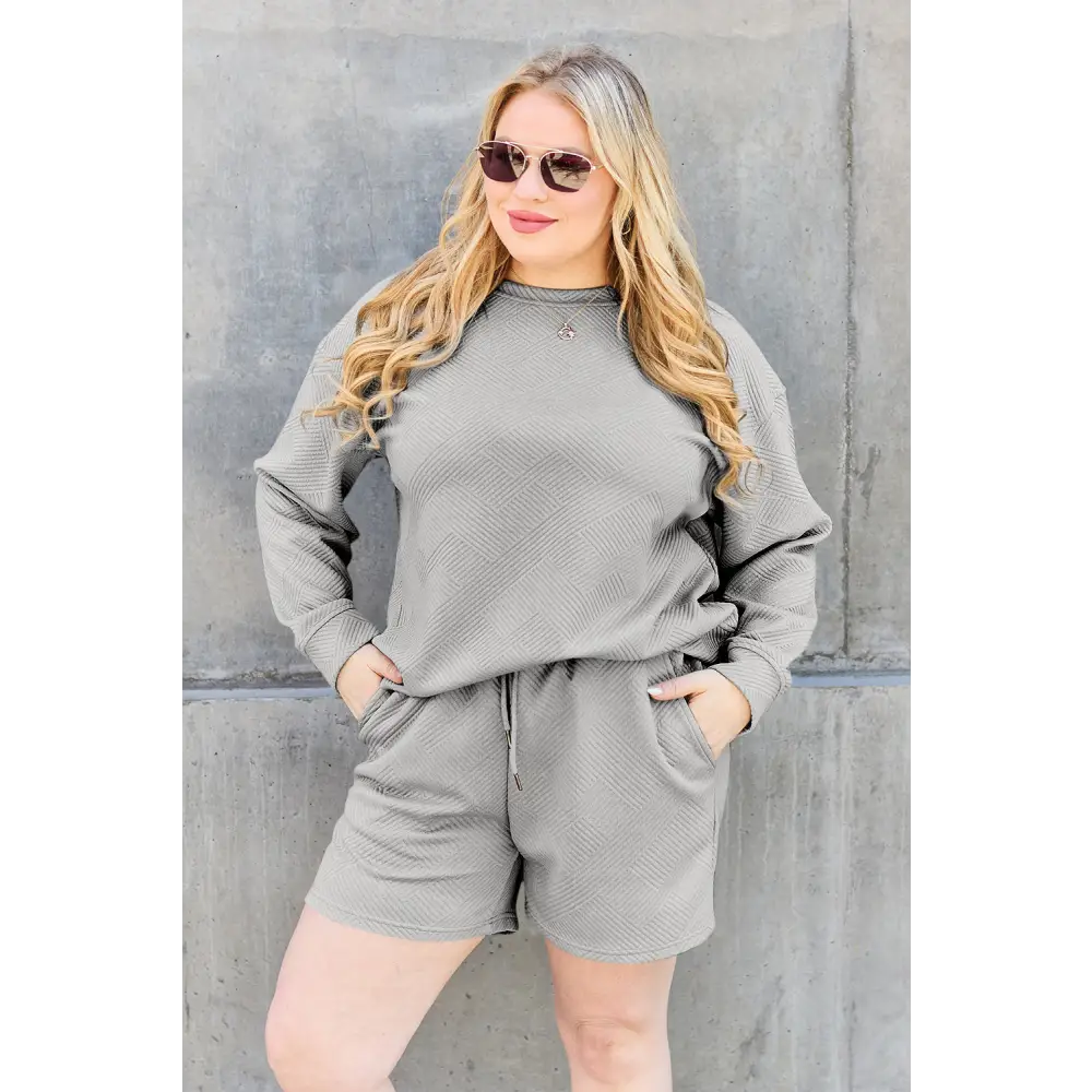Double Take Full Size Texture Long Sleeve Top and Drawstring Shorts Set.