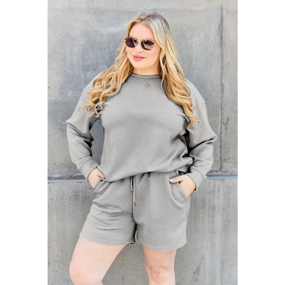 Double Take Full Size Texture Long Sleeve Top and Drawstring Shorts Set.