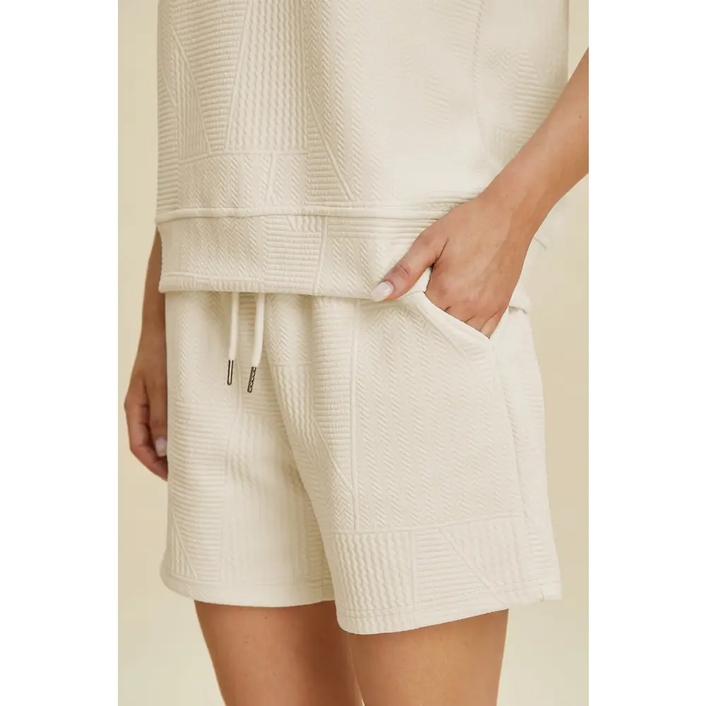 Double Take Full Size Texture Round Neck Ruffle Sleeve Top and Shorts Set.