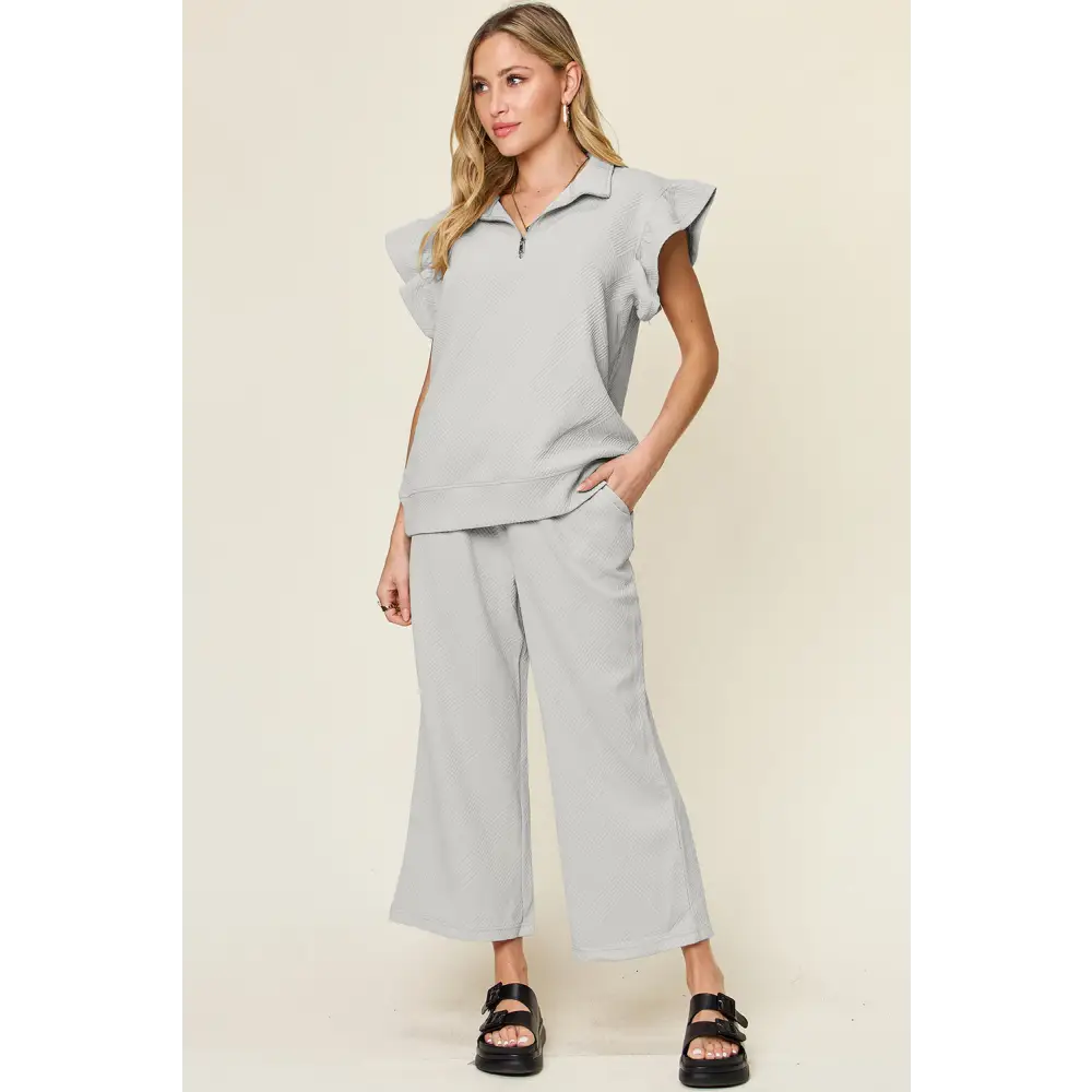 Double Take Texture Ruffle Short Sleeve Top and Drawstring Wide Leg Pants Set.