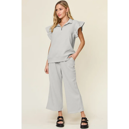 Double Take Texture Ruffle Short Sleeve Top and Drawstring Wide Leg Pants Set.