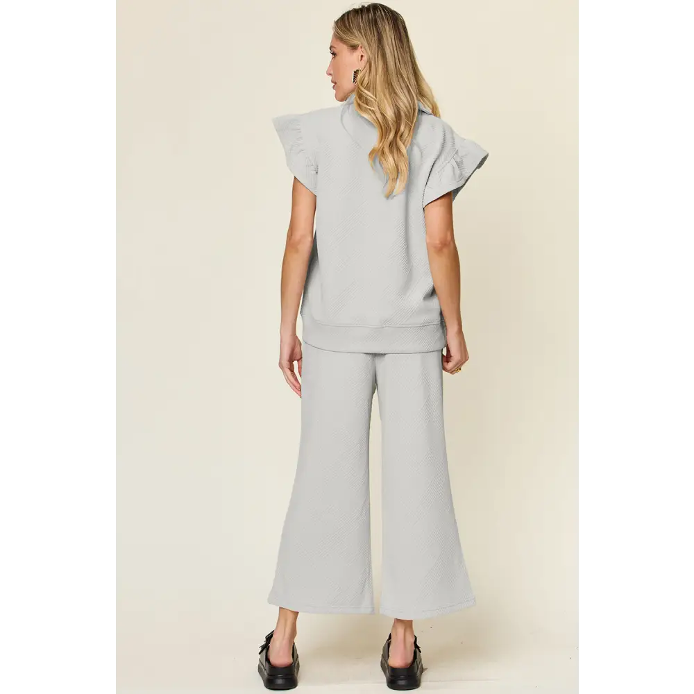 Double Take Texture Ruffle Short Sleeve Top and Drawstring Wide Leg Pants Set.